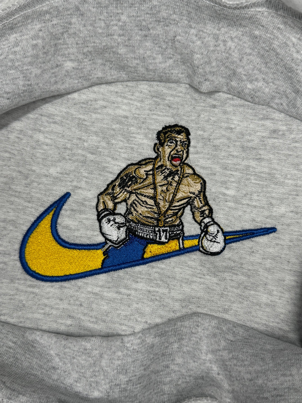 Usyk x Swoosh