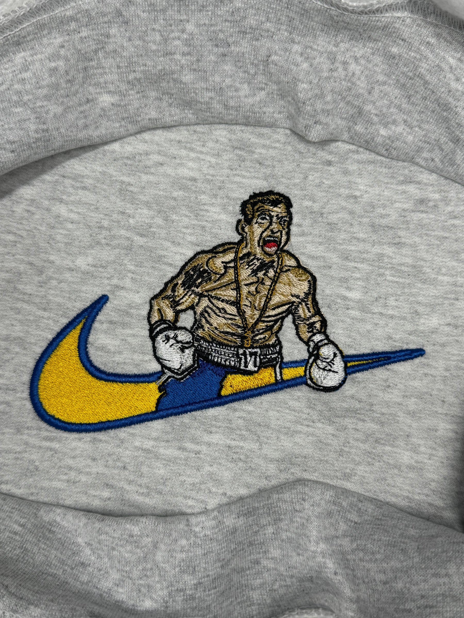 Usyk x Swoosh